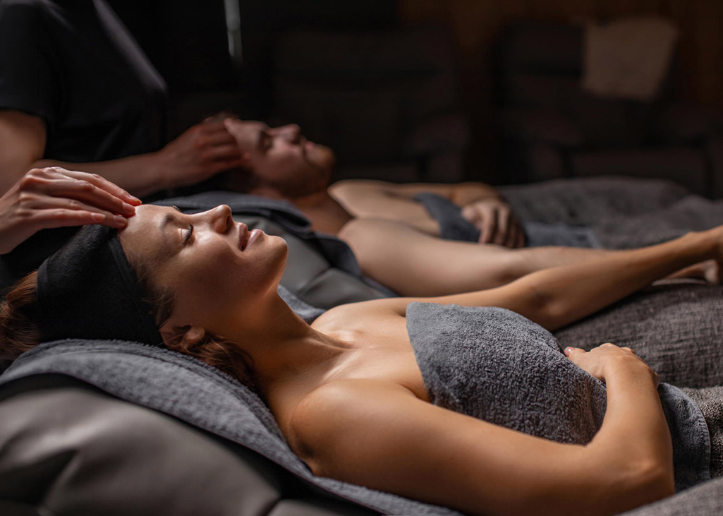 Couple getting head massage