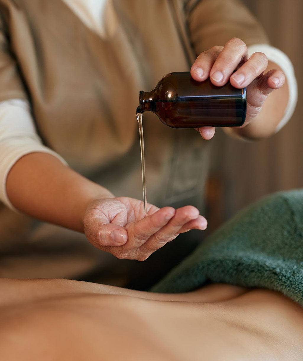 Pouring massage oil